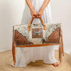 Cowhide duffel bag ships October
