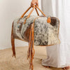 Cowhide duffel bag ships October